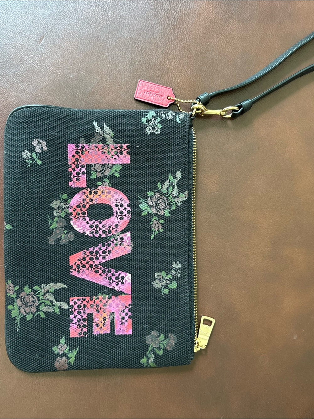 Coach Black Wristlet with Pink 'LOVE' Graphic and Floral Print